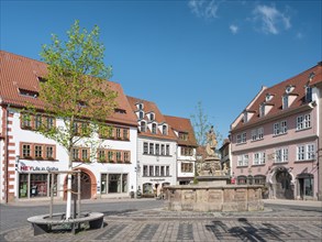The main market square in the historic old town with the Schellenbrunnen fountain, Gotha,