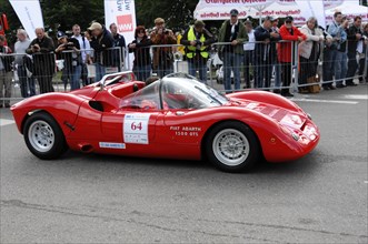 A red Fiat Abarth 1000 OTS waits on the road, ready to race, SOLITUDE REVIVAL 2011, Stuttgart,