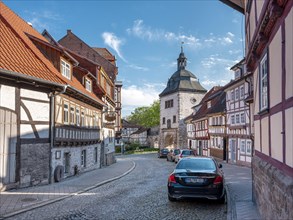 Street with cobblestones in the historic old town, half-timbered houses at the Frauentor,