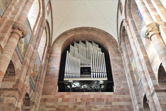 Speyer Cathedral, view of a church organ from the inside with many organ pipes and arches, Speyer