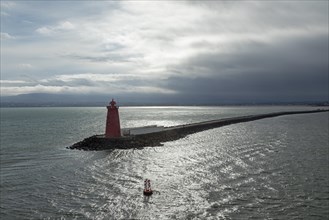 Lighthouse, harbour entrance, backlight, Dublin, Republic of Ireland