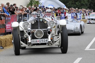 Mercedes-Benz SSK, built in 1928, classic racing car at a parade or demonstration in front of