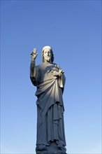 Church of Notre-Dame de la Garde, Marseille, statue of Jesus with blessing gesture under a deep