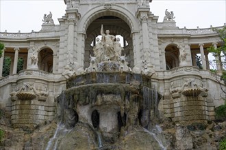 Palais Longchamp, Marseille, Majestic fountain with sculptures and floral archway, Marseille,