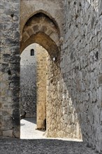 Jaen, Castillo de Santa Catalina on Jaen, Old stone archway in a historic fortress, Jaen, Baeza,
