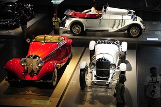 Large number of restored classic cars on display in a museum, Mercedes-Benz Museum, Stuttgart,