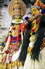 Kathakali performer or mime, 38 and 60 years old, on stage at the Kochi Kathakali Centre, Kochi,