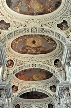St Stephen's Cathedral, Passau, Opulent ceiling fresco with angel figures in a baroque church, St