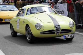 A yellow Alfa Romeo sports car in vintage style on the race track, SOLITUDE REVIVAL 2011,