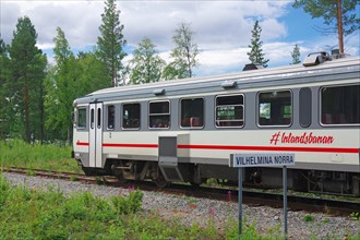 A diesel train of the Inlandsbanan in front of a forest, railway, inland railway, Vilhelmina Norra,