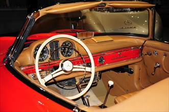 Museum, Mercedes-Benz Museum, Stuttgart, Interior view of a vintage Mercedes with red dashboard and