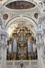 St Stephen's Cathedral, Passau, Magnificent baroque church organ with golden ornamentation under a