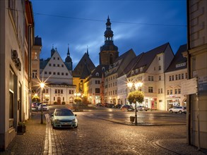 Market square with town hall, Luther monument and St Andrew's Church in the evening, Luther city