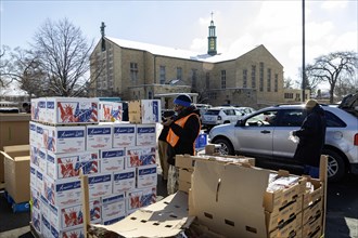 Detroit, Michigan, Free food is distributed to people attending a community health fair