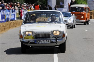 Vintage car driving on a road at an event with spectators, SOLITUDE REVIVAL 2011, Stuttgart,