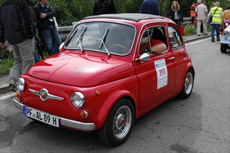 A red Fiat 500 classic car with the number 191 at a road race, SOLITUDE REVIVAL 2011, Stuttgart,