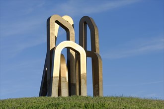 Marseille, A large abstract metal sculpture stands on a grassy hill, Marseille, Departement Bouches