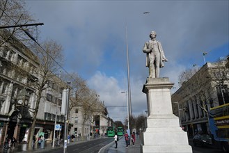 The Sir John Gray monument in O'Connell Street with the Spire in the background. Dublin, Ireland,