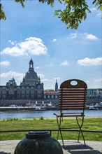 Folding chair arrangement on the Koenigsufer with a view of the Church of Our Lady and Bruehl's