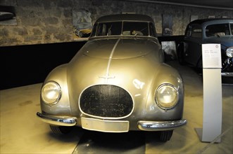 Deutsches Automuseum Langenburg, Front view of a bronze vintage sports car at a car exhibition,