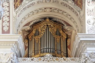 St Stephan Cathedral, Passau, Opulently decorated golden baroque organ in a church, St Stephan