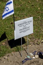 Ferndale, Michigan, An Israeli flag and small stones on the grave of Samantha Woll in Machpelah