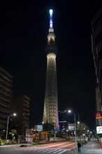 634 meters high Tokyo Skytree, broadcasting and observation tower in Sumida illuminated at night in