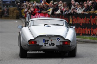 Rear view of a white Marcos GT at a classic car rally, SOLITUDE REVIVAL 2011, Stuttgart,