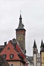 Wuerzburg, view of medieval towers with clocks, surrounded by colourful roofs and tiles, Wuerzburg,