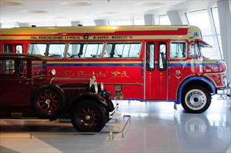 Red historic Mercedes-Benz bus as a fire engine in a vehicle exhibition, Mercedes-Benz Museum,