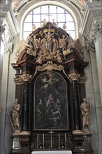 St Stephen's Cathedral, Passau, Imposing baroque altar with coat of arms, surrounded by artistic