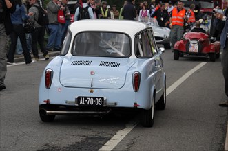 Rear view of a light blue small car at an event in front of an audience, SOLITUDE REVIVAL 2011,