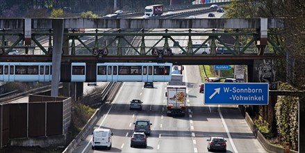 Wuppertal suspension railway crosses the A46 motorway at Sonnborner Kreuz, inner-city motorway