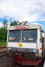 A diesel train of the Inlandsbanan in front of a forest, railway, inland railway, Vilhelmina Norra,