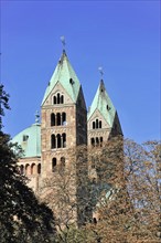 Speyer Cathedral, Medieval church with pointed towers under a clear blue sky, Speyer Cathedral,