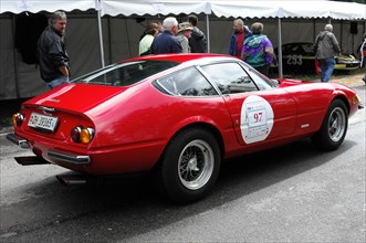 A red sports car with racing stripes and the number 97 on the side, SOLITUDE REVIVAL 2011,