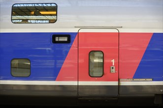 Marseille, Red-blue carriage of a TGV train, first class door clearly visible, Marseille,