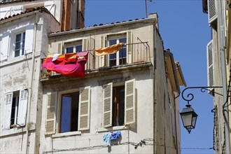 Marseille, Old Mediterranean buildings with laundry hanging from shutters, Marseille, Departement