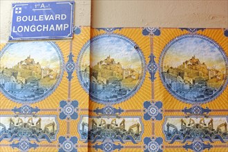 Wall tiles with Boulevar, d Longchamp lettering and depiction of a cityscape, Marseille,