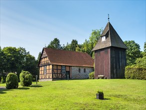 Half-timbered church and free-standing bell tower, Undeloh, Lueneburg Heath, Lower Saxony, Germany,