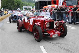 A red vintage car with driver prepares for the start, SOLITUDE REVIVAL 2011, Stuttgart,