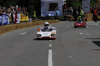 Racing driver in a miniature racing car on a race track in front of spectators, SOLITUDE REVIVAL