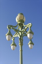 Marseille, Antique green street lamp in front of a clear blue sky, Marseille, Departement