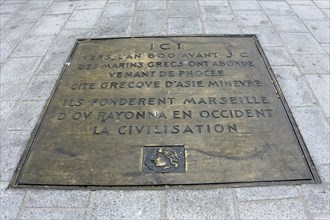 Marseille, plaque embedded in the pavement marking the foundation of Marseille, Marseille,