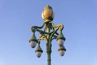 Decorated street lamp in front of a clear blue sky, Marseille, Departement Bouches-du-Rhone,