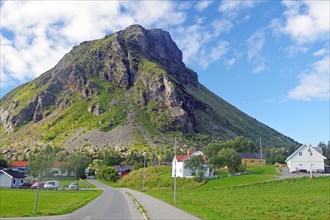 Distinctive high mountain and a narrow road, Lovund, Lovunden, Helgeland coast, Norway, Europe