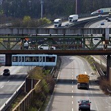 Wuppertal suspension railway crosses the A46 motorway at Sonnborner Kreuz, motorway junction,