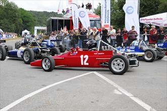 Red classic racing car with starting number 12 ready for the race, SOLITUDE REVIVAL 2011,