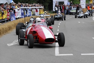 A red vintage formula racing car on a race track at a classic car event, SOLITUDE REVIVAL 2011,