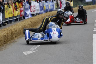Racer on a motorbike with sidecar in racing action, SOLITUDE REVIVAL 2011, Stuttgart,